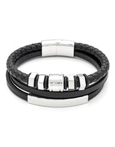 Black leather bracelet with silver metal elements on a white background
