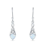 Silver celtic trinity earrings with heart-shaped opal stones on a white background