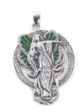 Silver pendant with green winged fairy on lotus with celtic knot work in halo on a white background