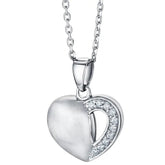 Silver heart-shaped pendant with clear cubic zirconia on a white background