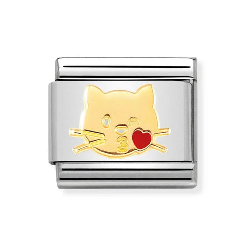 Silver charm with a gold cat face and red heart on a white background