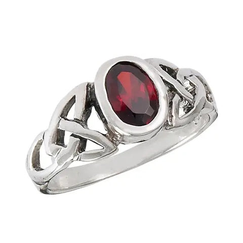 Silver trinity triquetra ring with a red gemstone on a white background