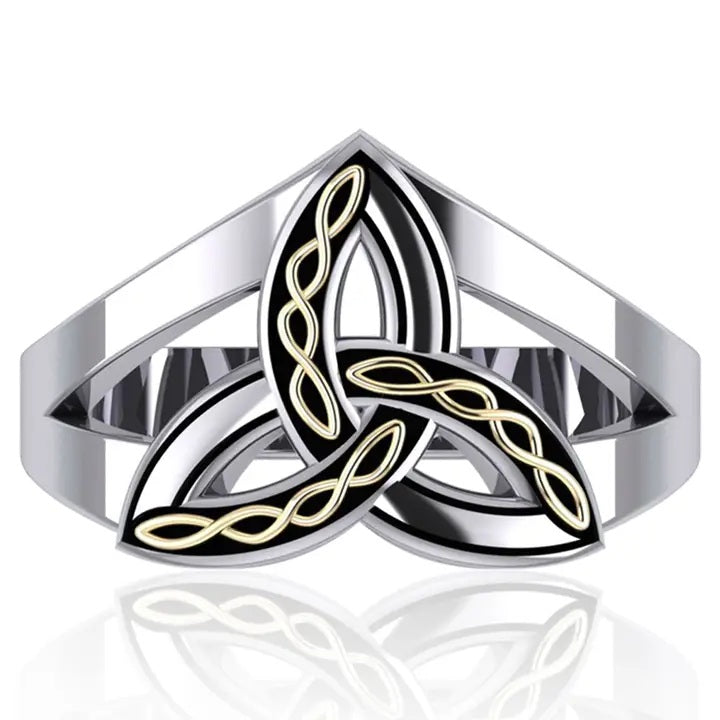 Silver triquetra trinity ring with a Celtic knot design on a white background