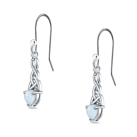 Silver celtic trinity earrings with opal stones on a white background