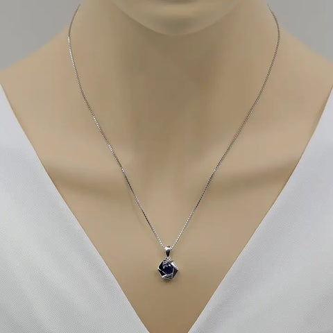 Silver necklace with a blue pendant on a mannequin neck against a white background