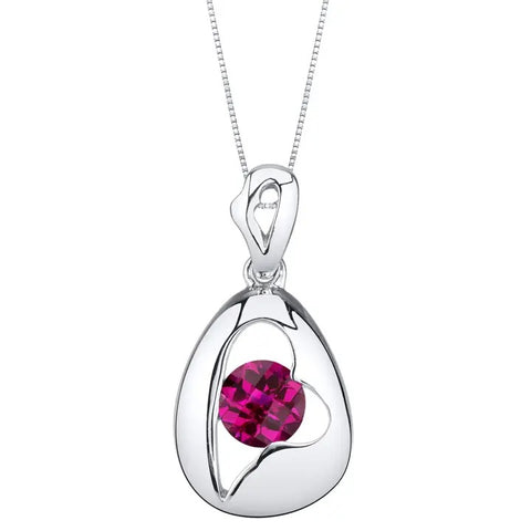Silver pendant with a vibrant pink gemstone on a white background