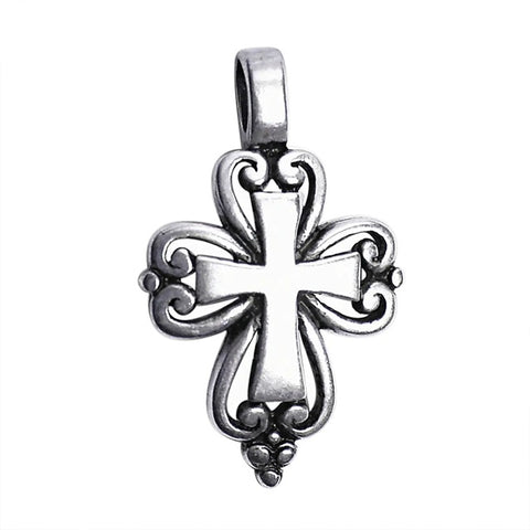 Silver cross pendant on a white background