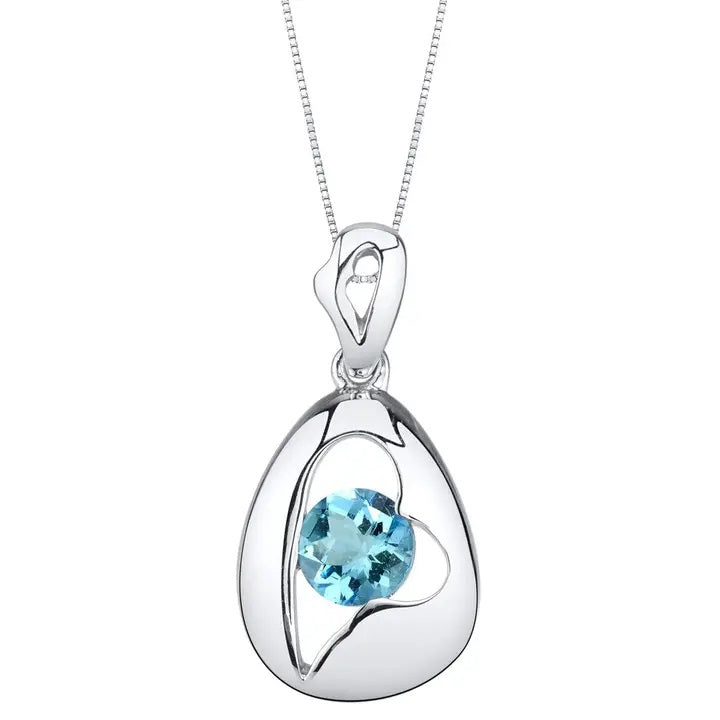 Silver pendant with a blue gemstone on a white background